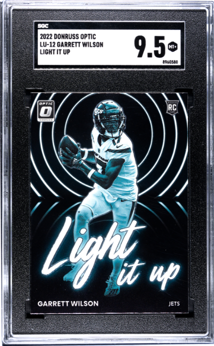 2022 Donruss Optic #LU-12 Garrett Wilson Light It Up RC SGC 9.5 — Front
